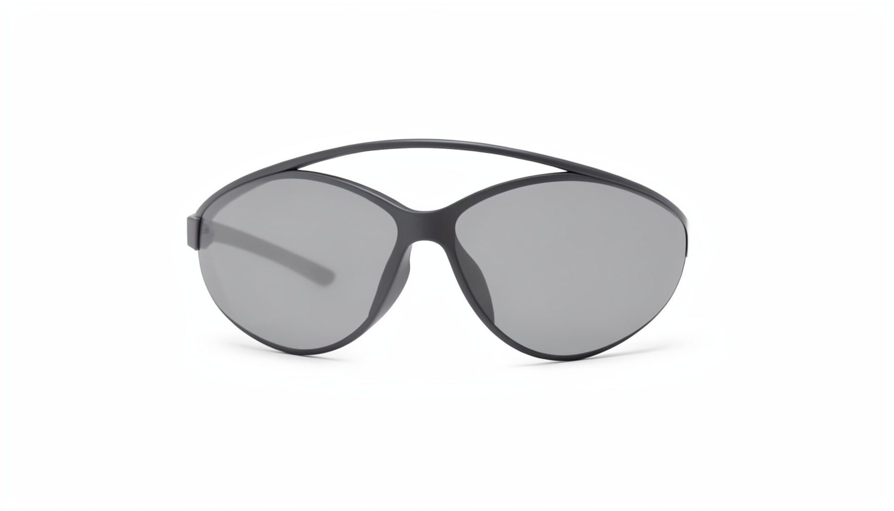 Sleek dark grey oval silhouette on a white field, suggesting high-performance eyewear